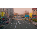 老青岛杭州路清晨的来往车流延时摄影